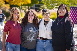 Colorado Mesa FGCC Event Four People Hugging