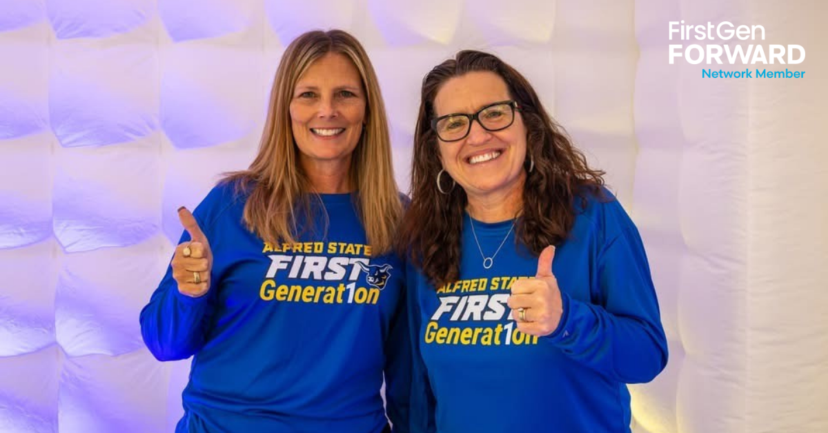 Alfred State College two indiviuals in blue college First Generation long sleeves giving thumbs up. 