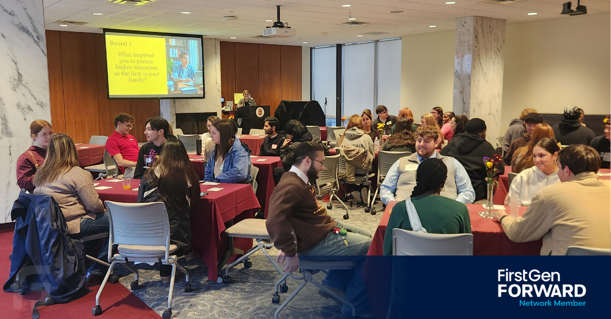 Alumni World Cafe students at tables at St John Fisher networking